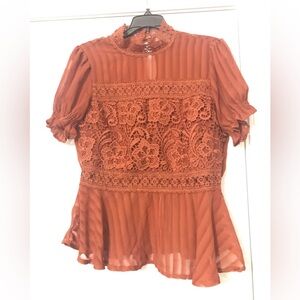 Rust color peplum blouse